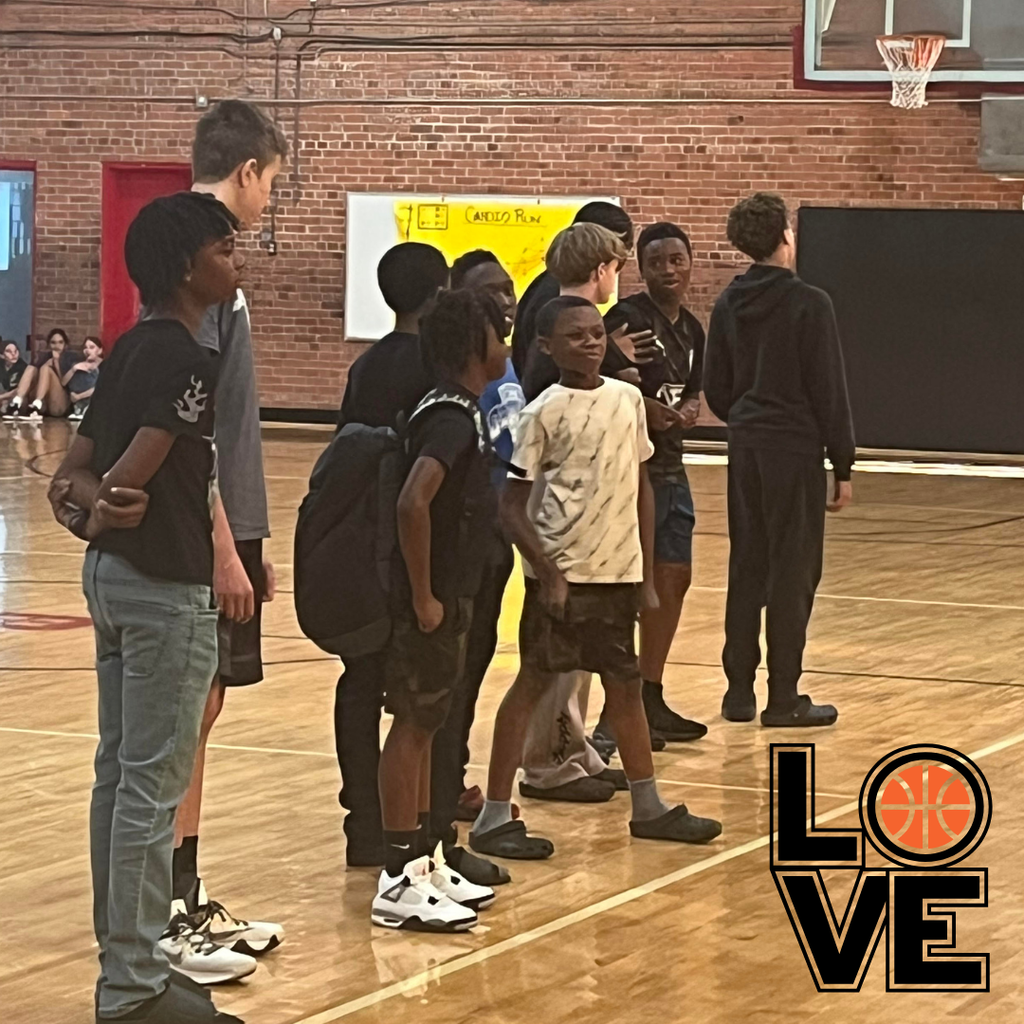 basketball team lined up in gym