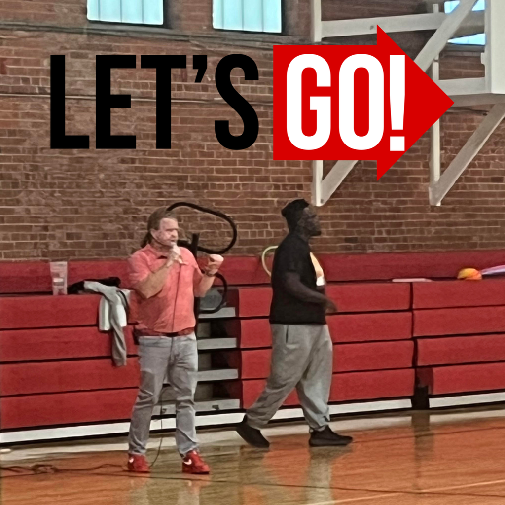 admin and teacher in gym with microphone