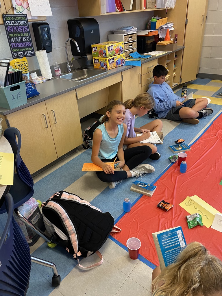 5th graders participating in a book tasting