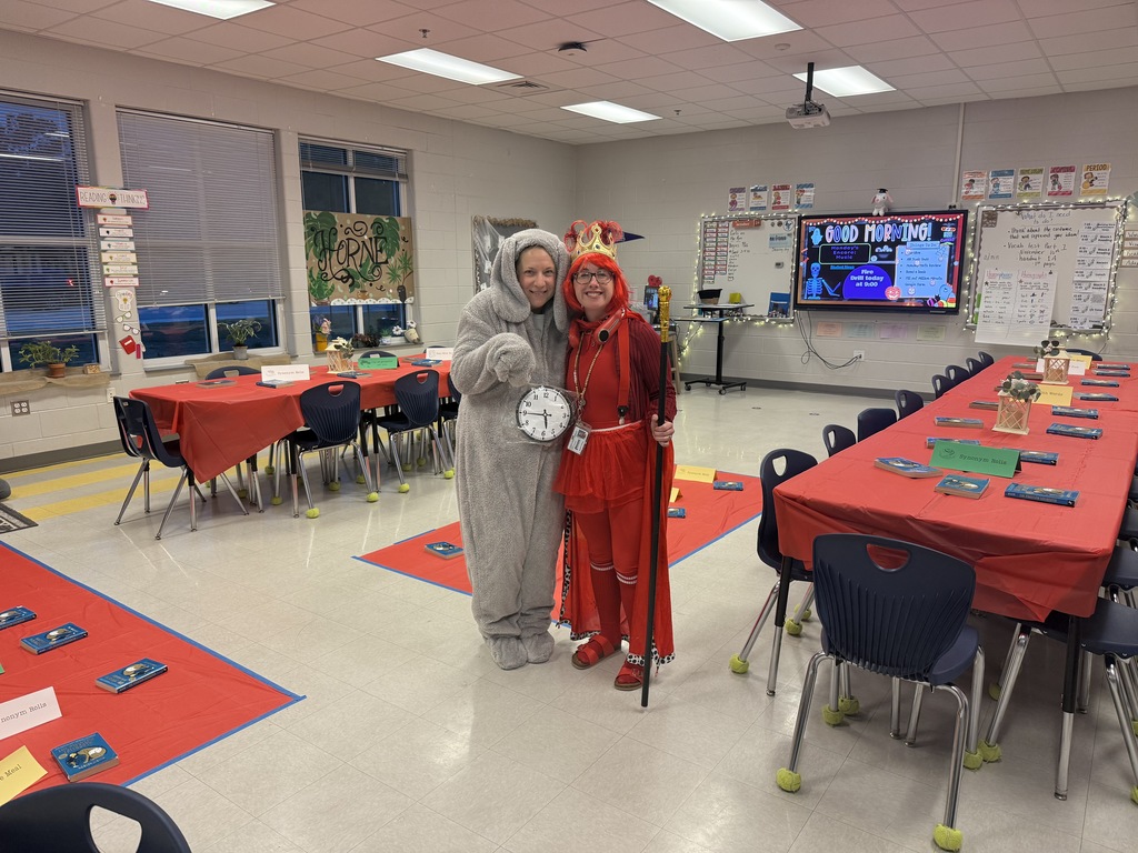 5th grade teachers dressed up in preparation for a book tasting lesson