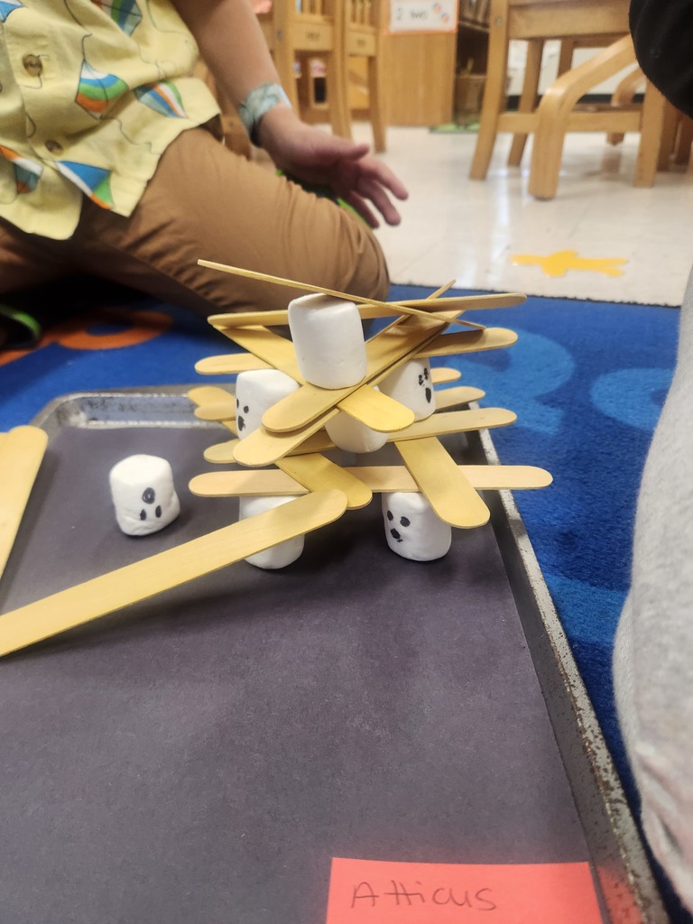 preK students working on Halloween stem projects