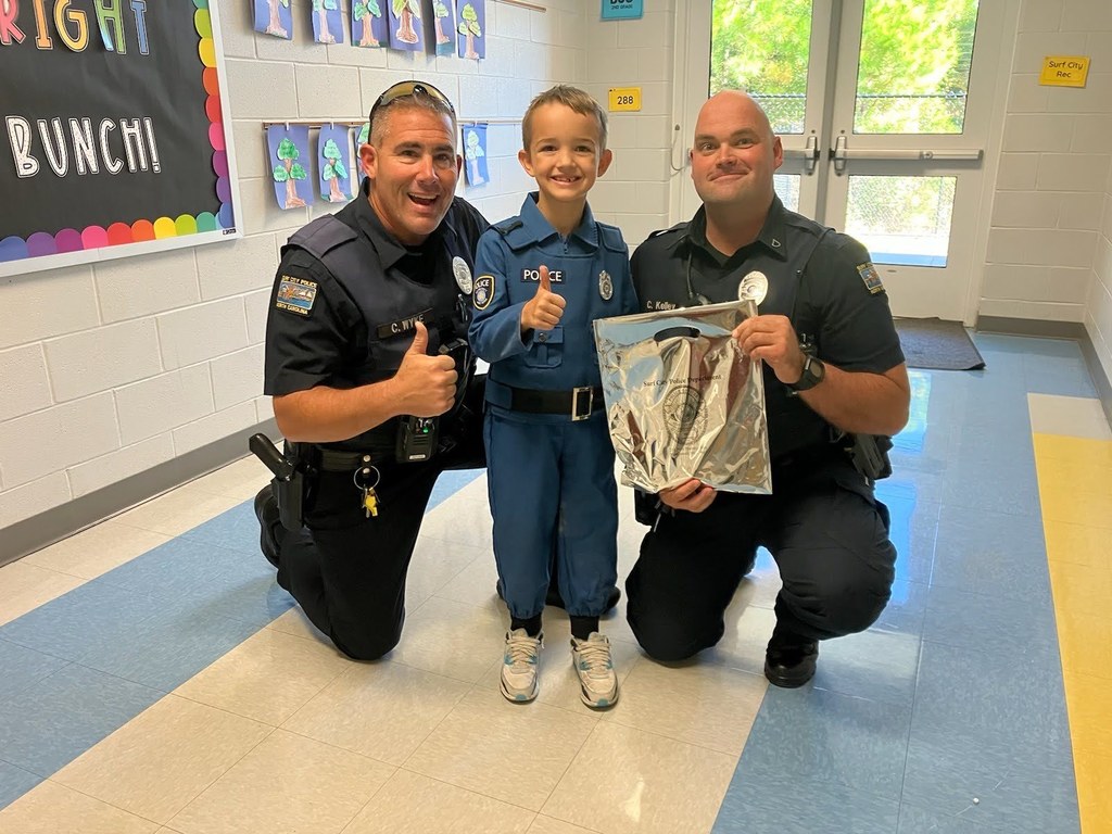 officer Kelley & officer Wyke with a student