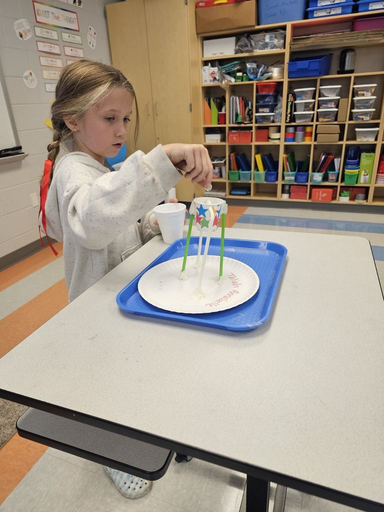 3rd graders working on a STEAM projects in small groups