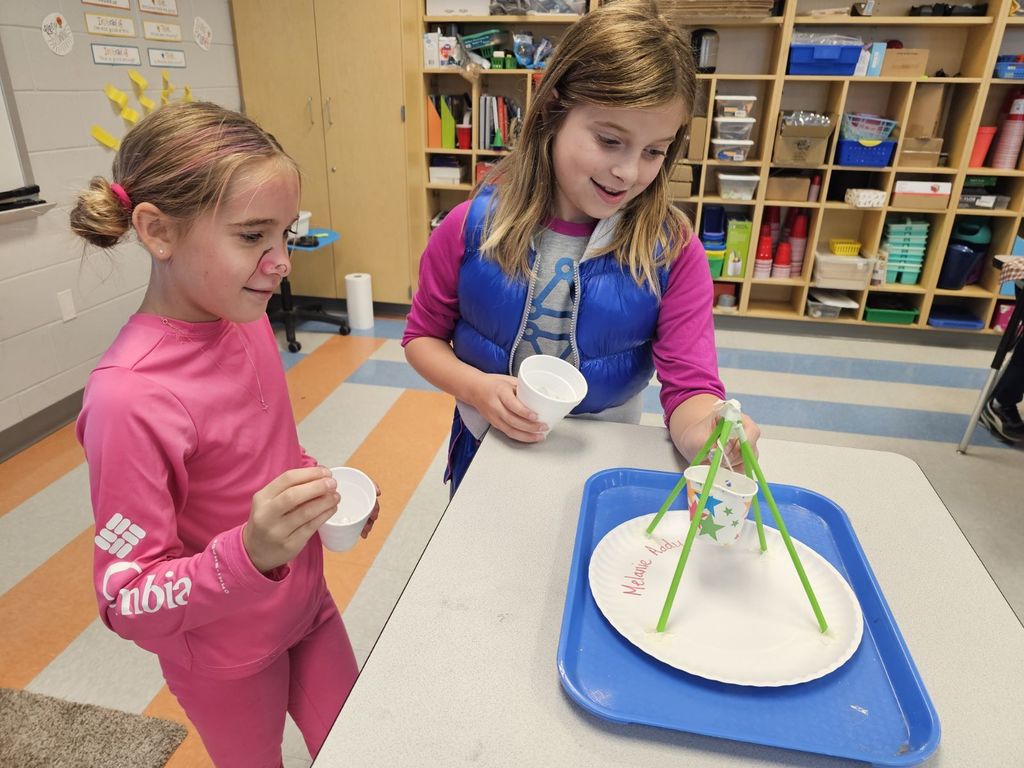 3rd graders working on a STEAM projects in small groups