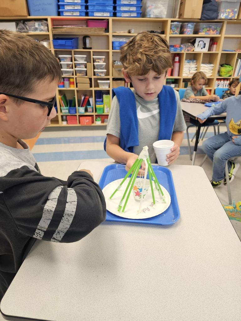 3rd graders working on a STEAM projects in small groups