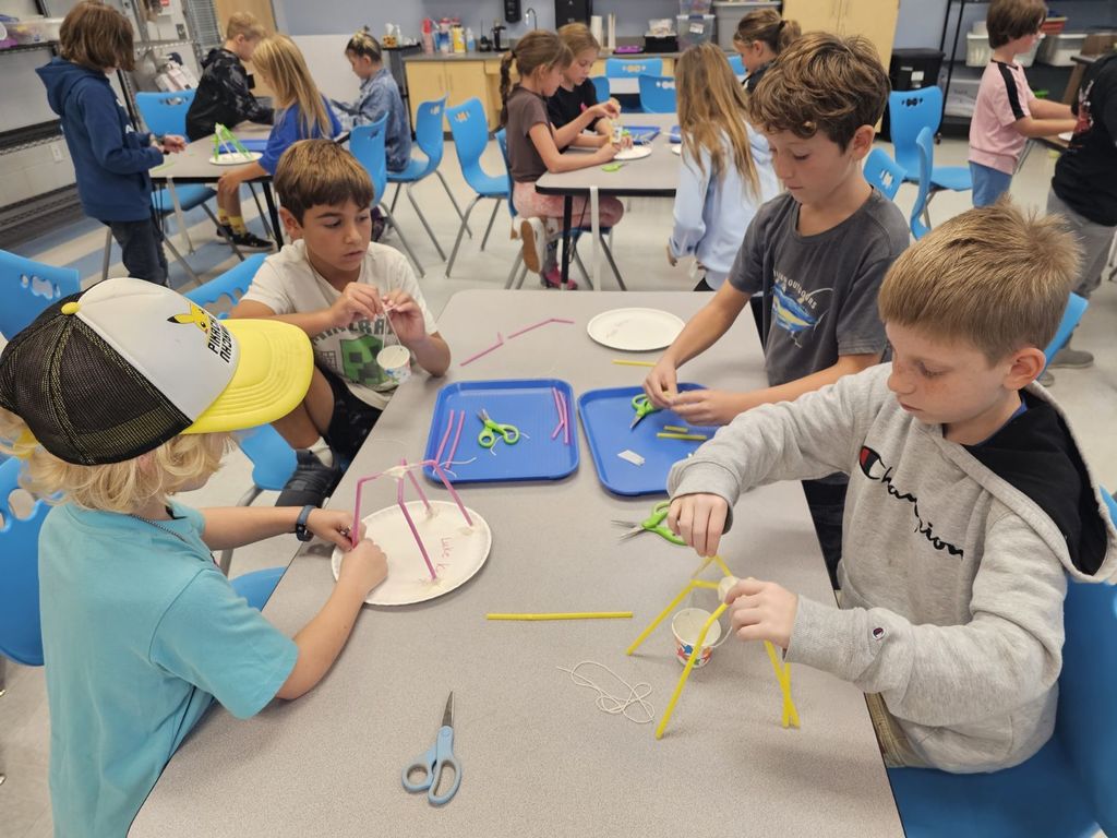 3rd graders working on a STEAM projects in small groups