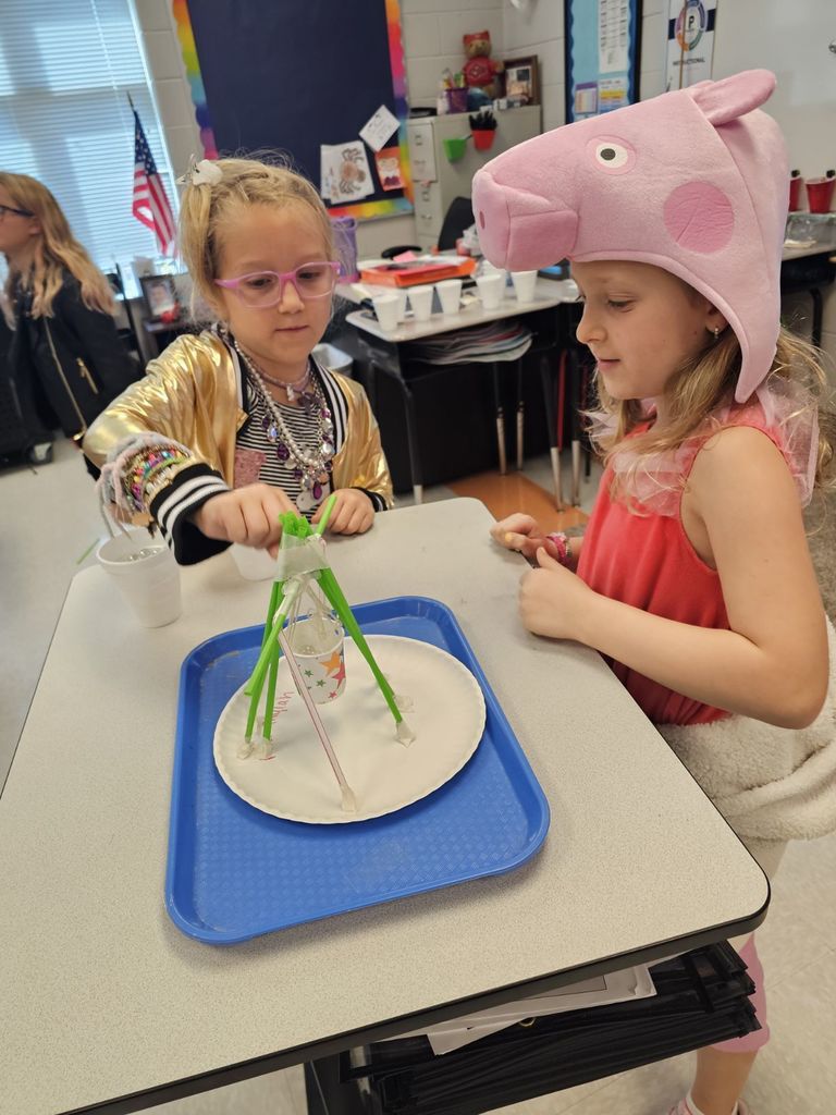 3rd graders working on a STEAM projects in small groups
