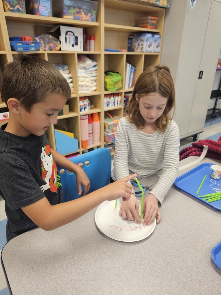 3rd graders working on a STEAM projects in small groups