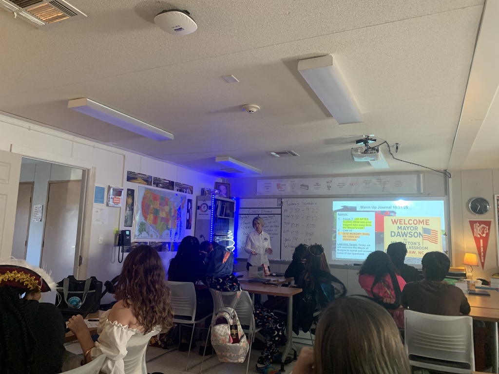 The mayor of Burgaw speaking to a Pender Early student