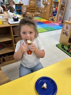 prek students eating bread that they made