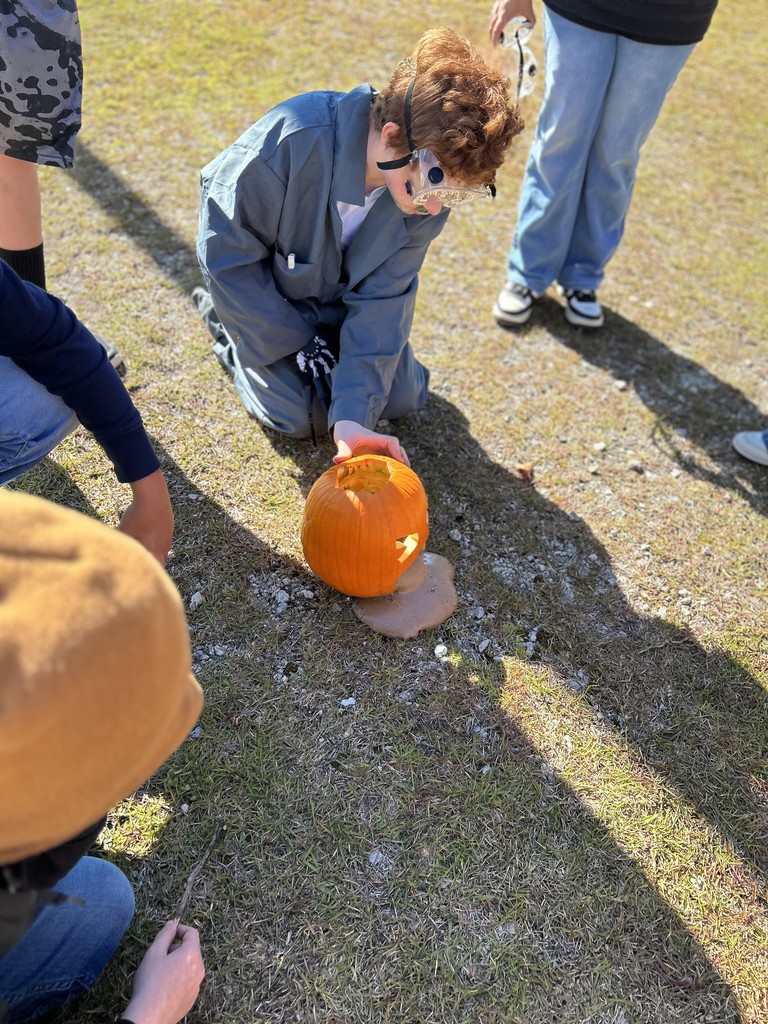 8th grade students conduct science experiments