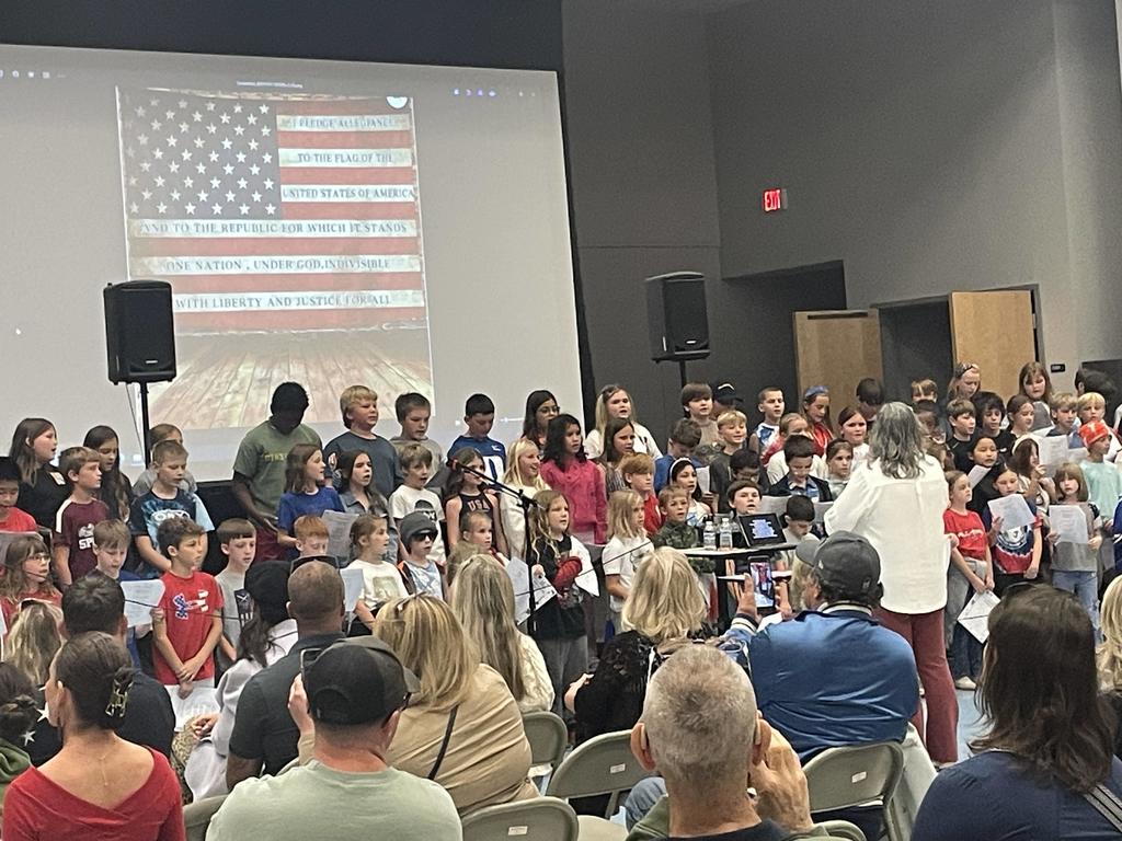 4th grade students singing at a Veterans Day concert