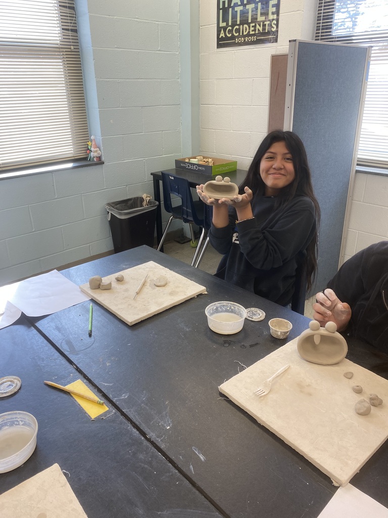 Creating pottery in art!