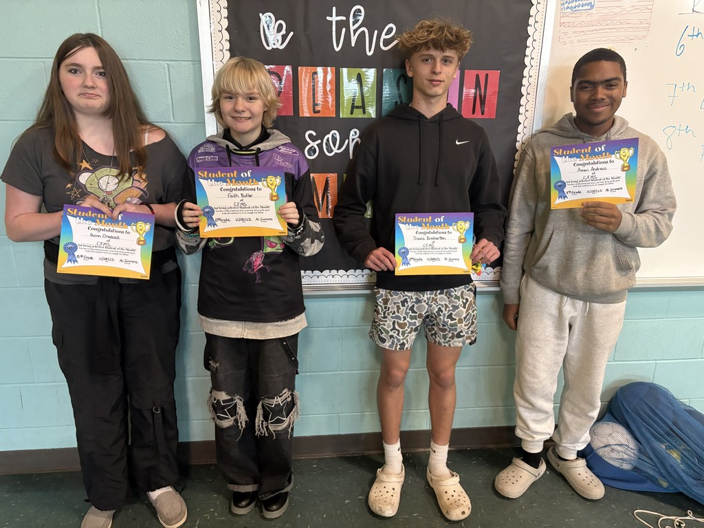November 8th grade students of the month: Quinn, Faith, Travis, and Amari.