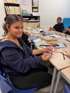 The kids are enjoying a project provided by the National Inventors Hall of Fame. It is called Circuit Sculptures.