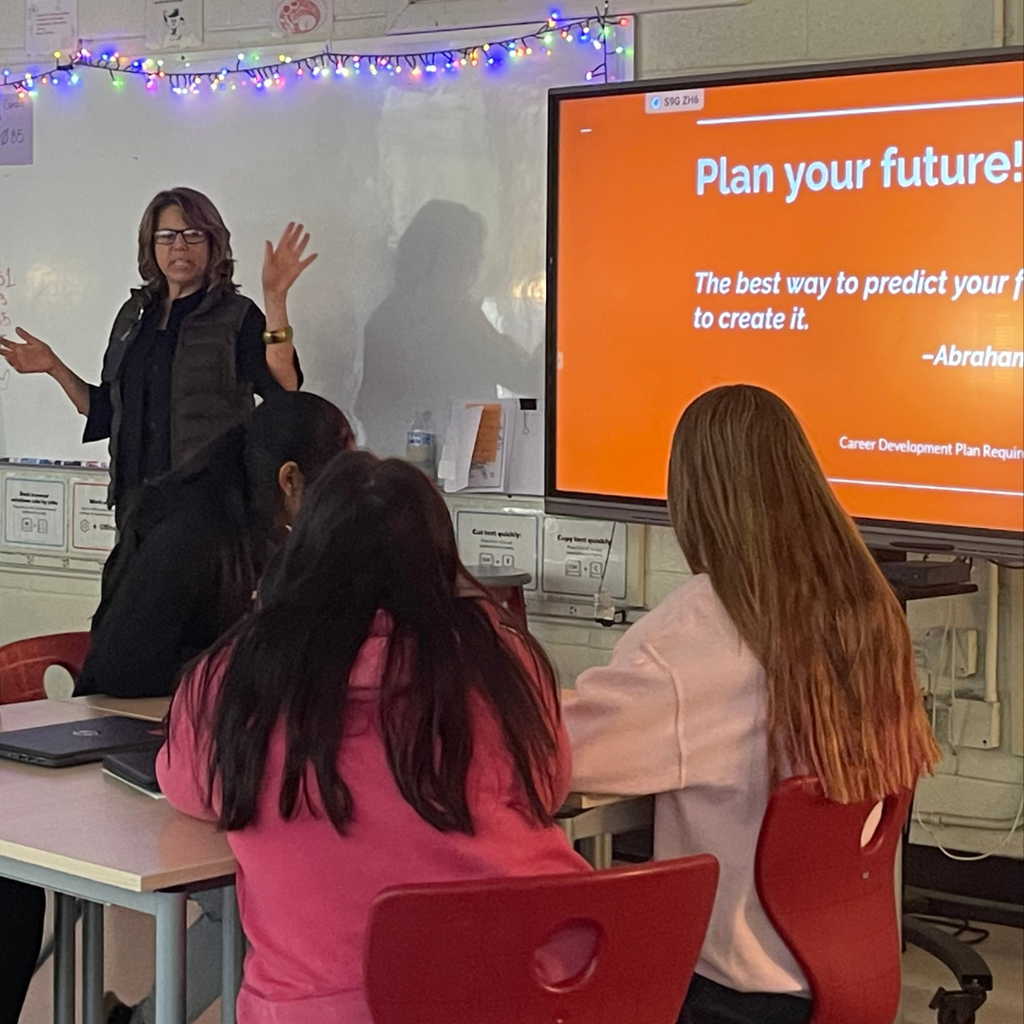 teacher with students in classroom