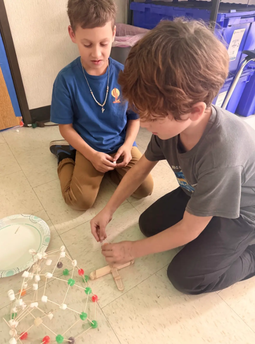 3rd graders working in groups of 2 on STEM projects