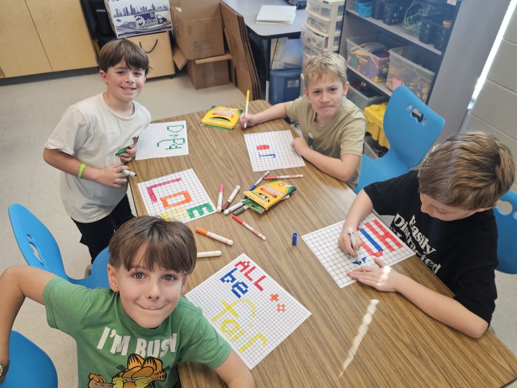 students working on a MLK word project