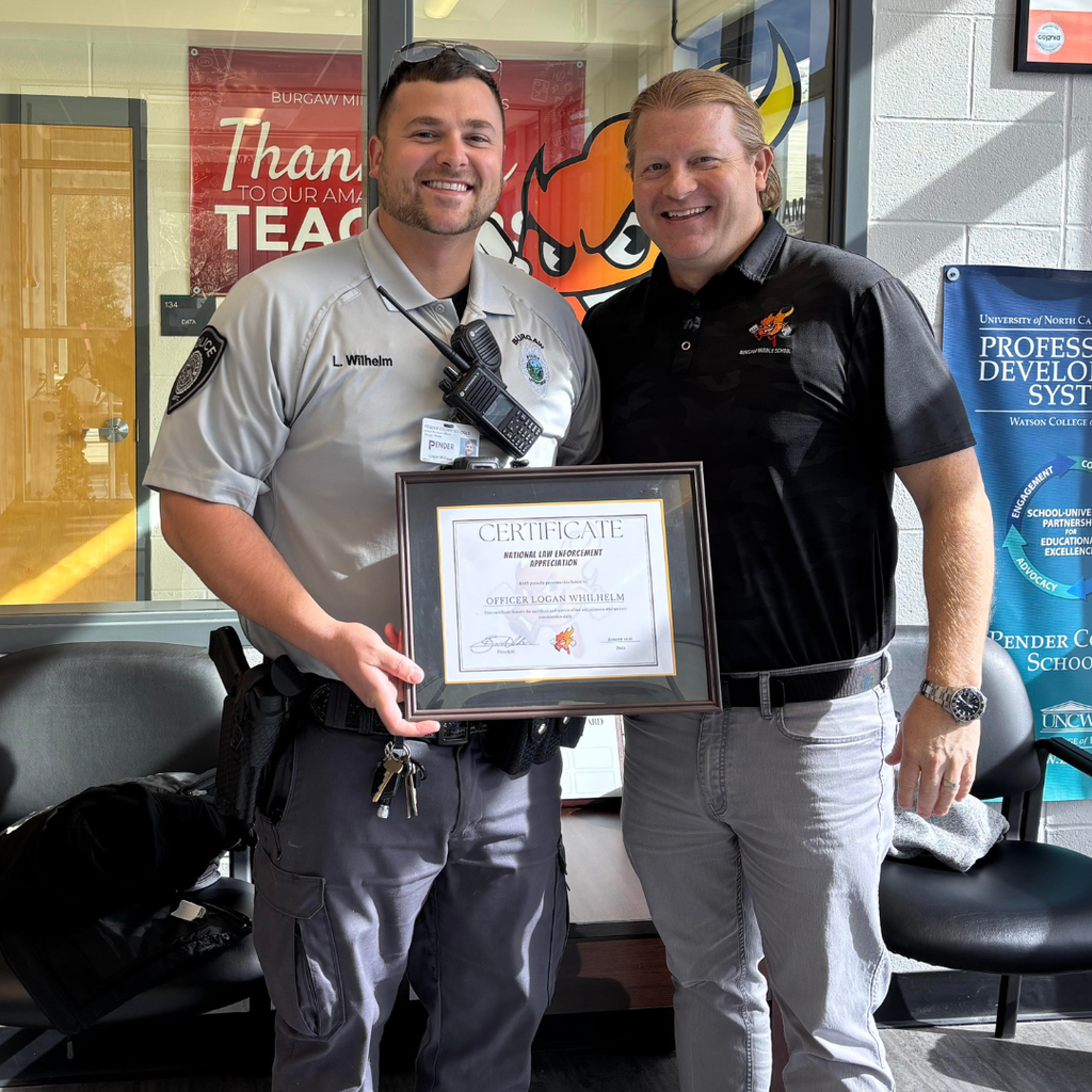 officer with principal holding certificate of appreciation