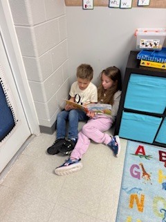 first graders partner reading