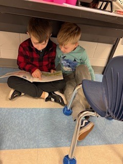 first graders partner reading