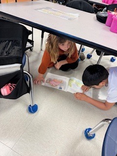 first graders partner reading