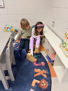 first graders partner reading