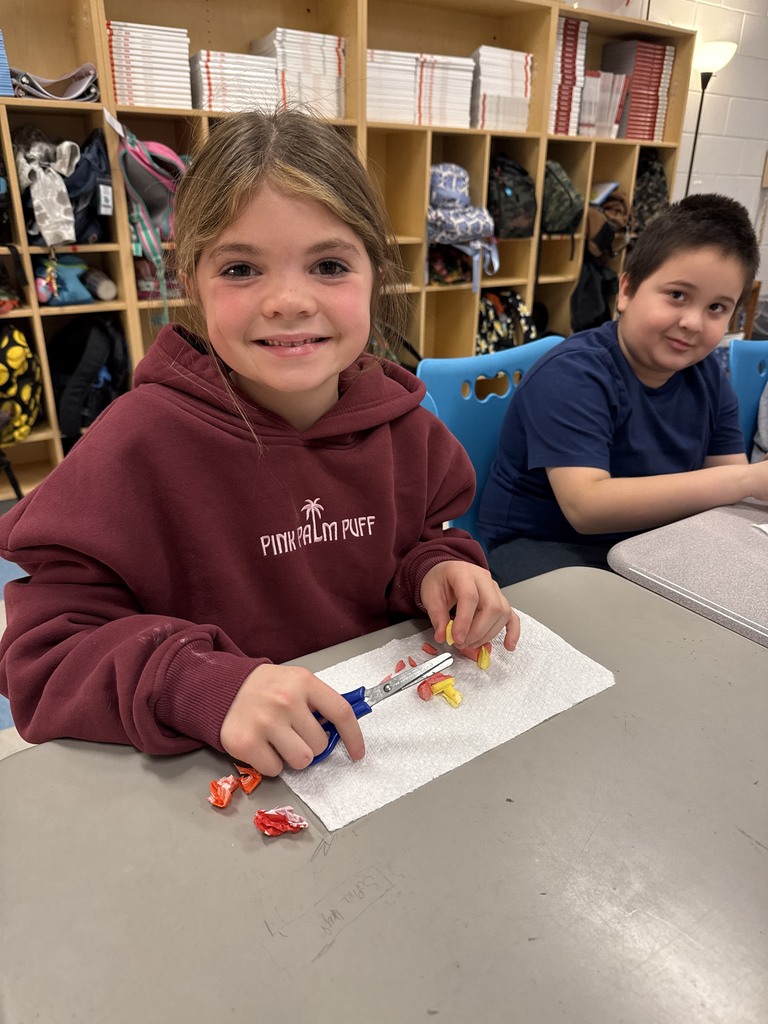 starbusts unwrapped on a students desk