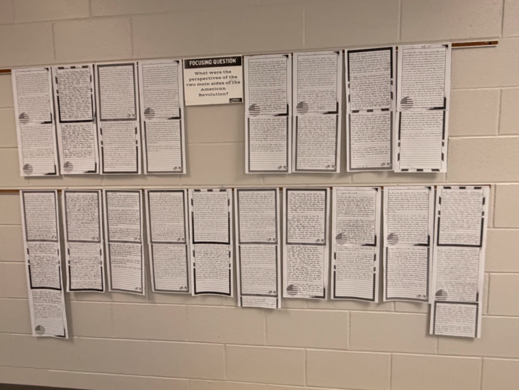 essays hanging in the hallway