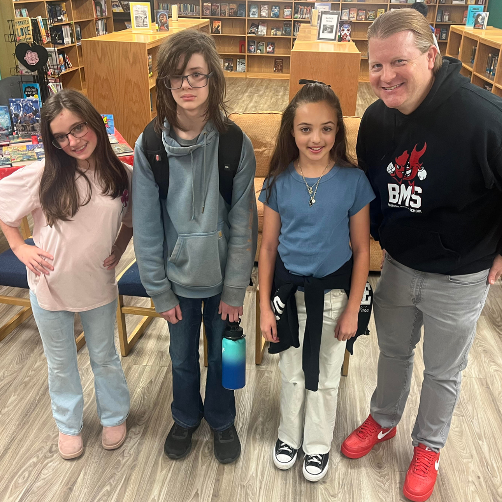 winners with principal at spelling bee