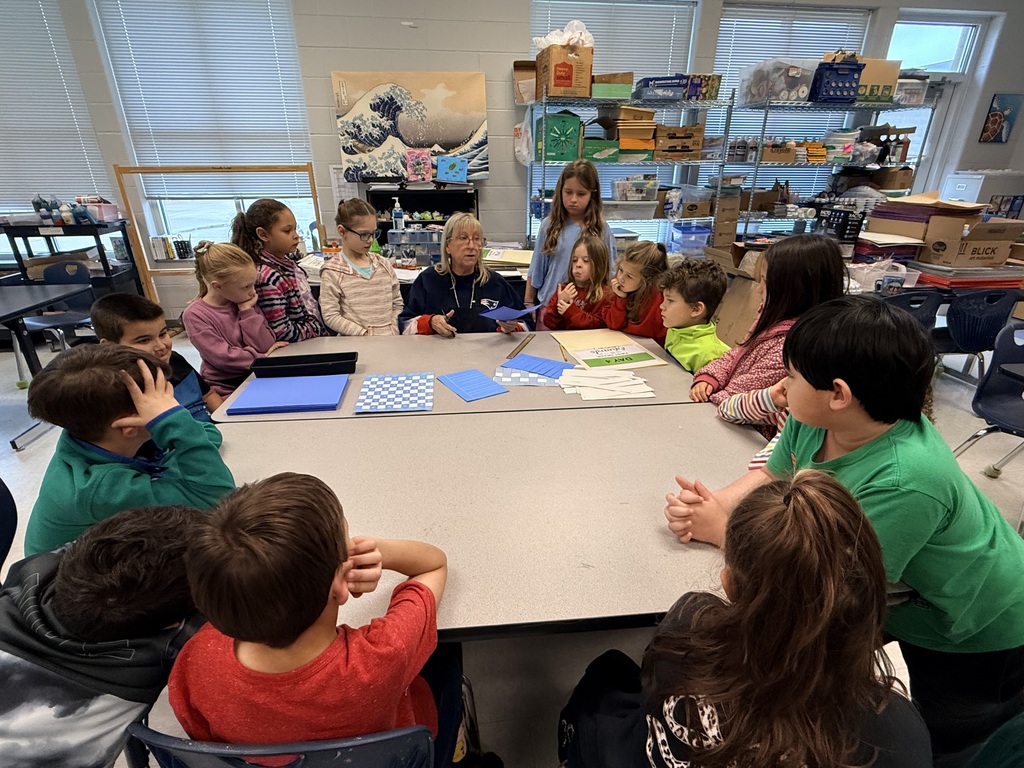 Mrs. Hanson teaching art class