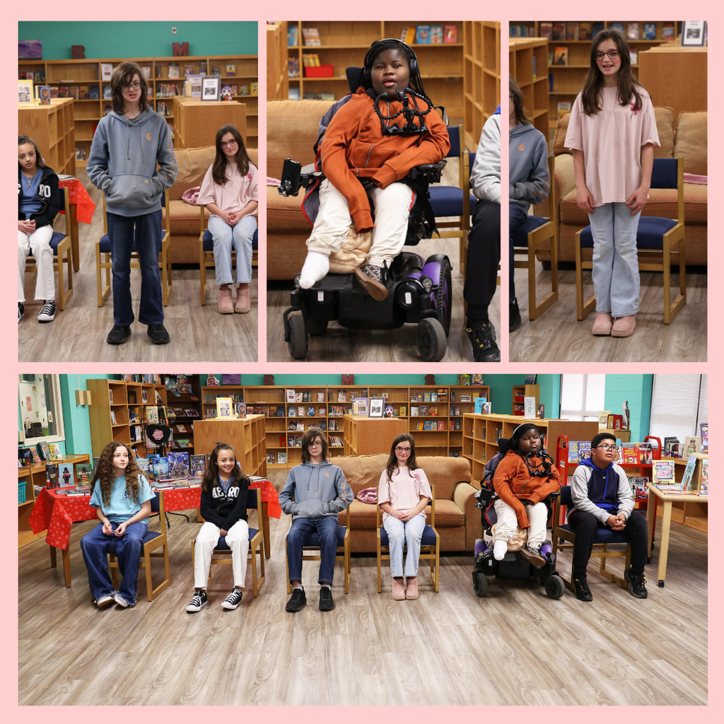 students participating in spelling bee in library