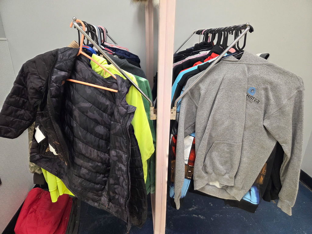 coats hanging on a rack