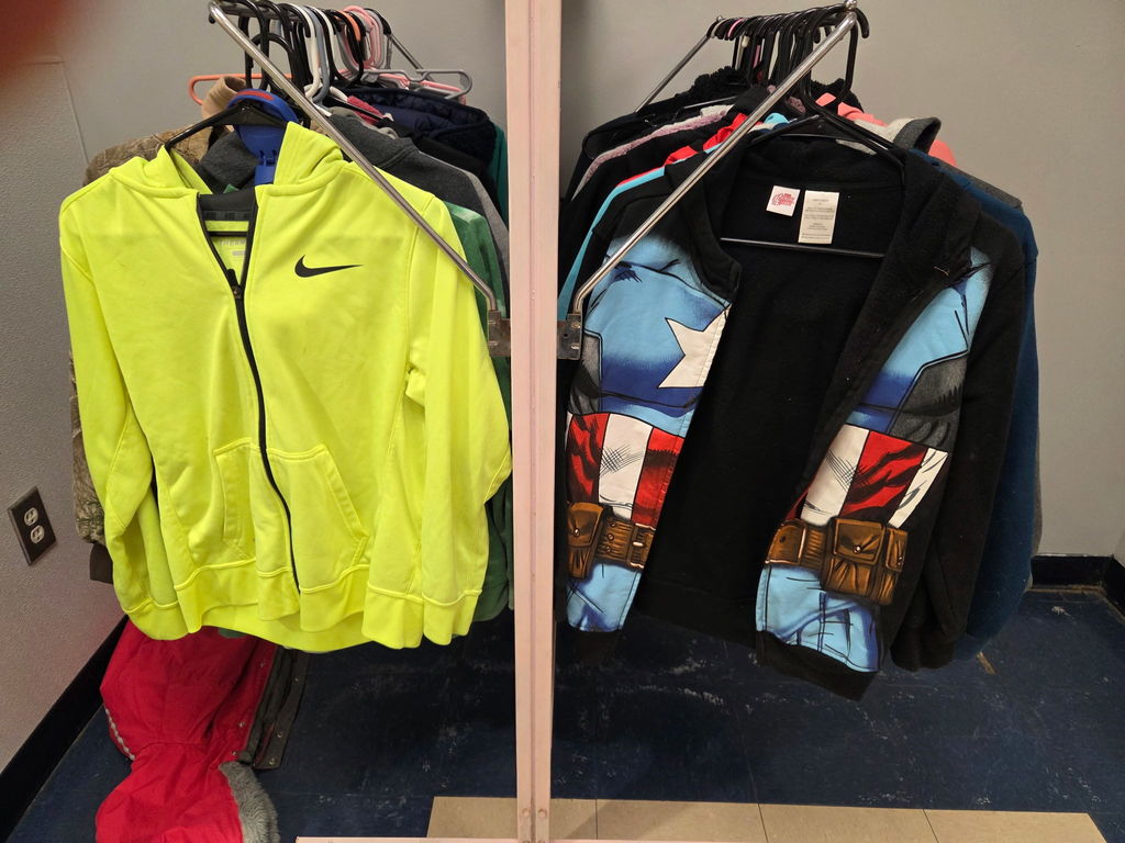 coats hanging on a rack