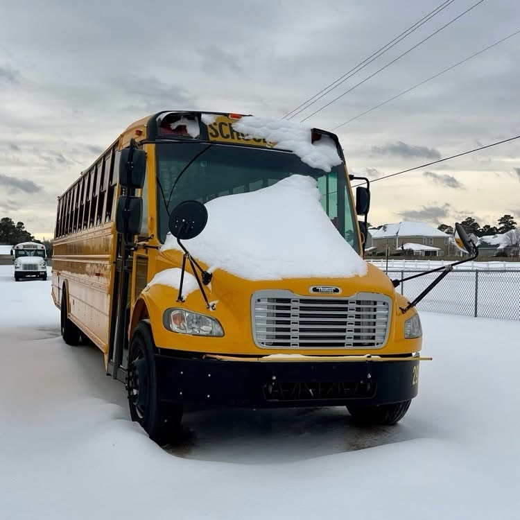 PCS bus with snow on the hood