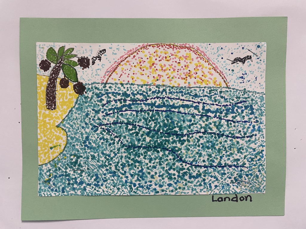 art work hanging in the hallway