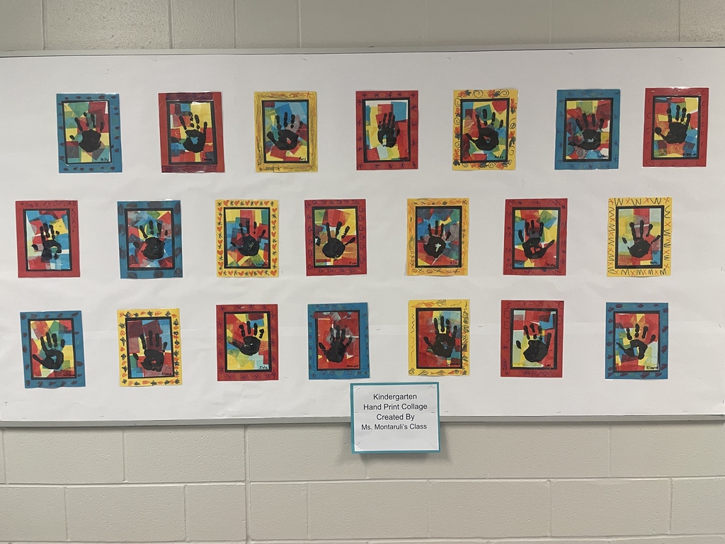 art work hanging in the hallway