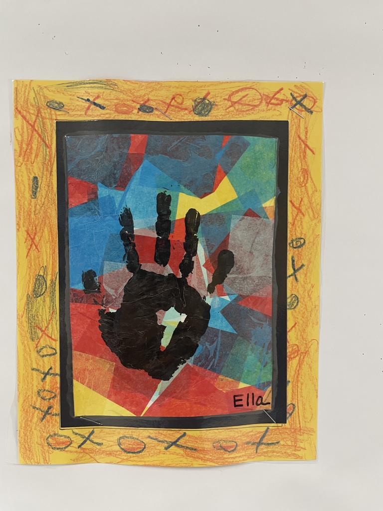 art work hanging in the hallway