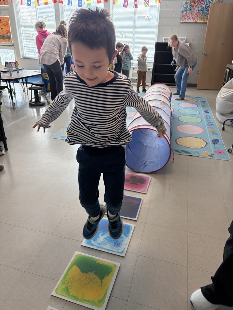students doing winter olympic activities in a classroom