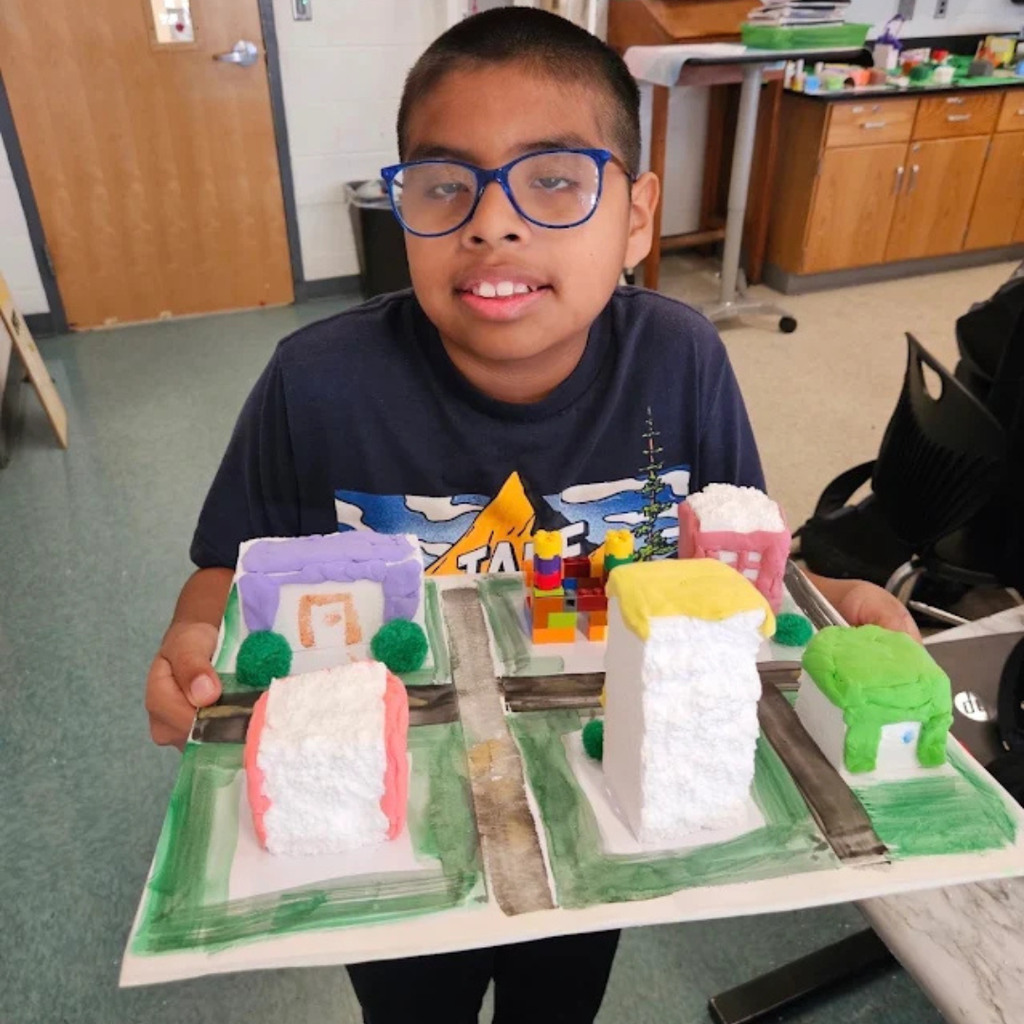 student working in science class