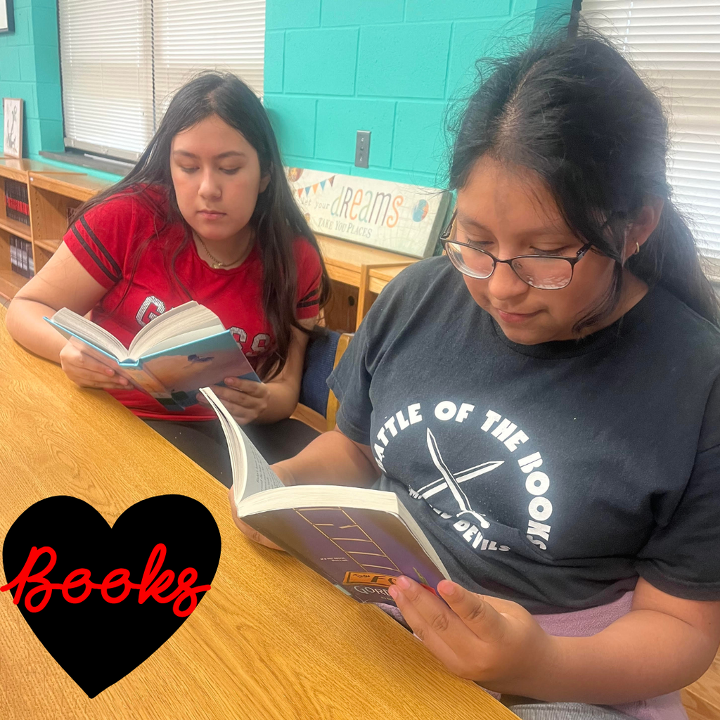 students reading in the library