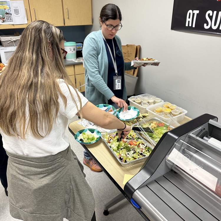 staff eating lunch from the Peak