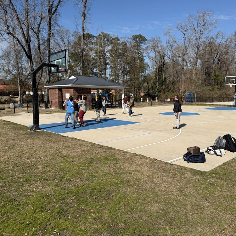 Students playing basketball