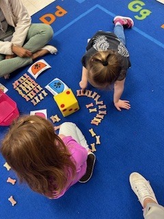 PreK students working and learning 