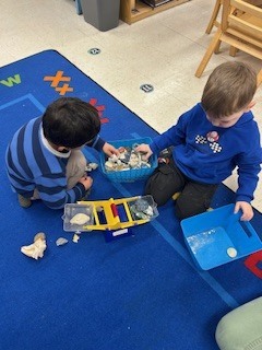 PreK students working and learning 