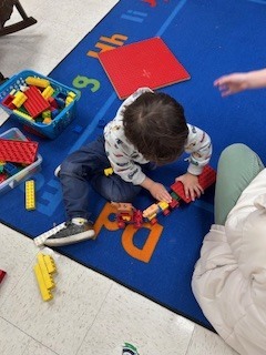 PreK students working and learning 
