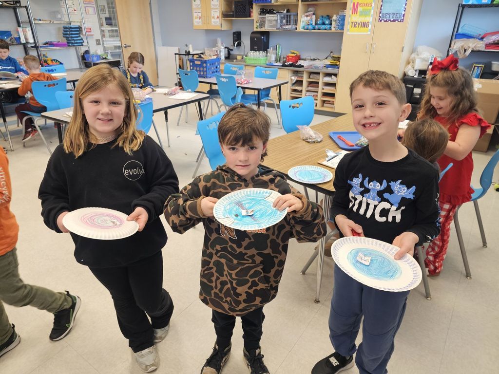 1st grade working on a magnet activity in STEAM class
