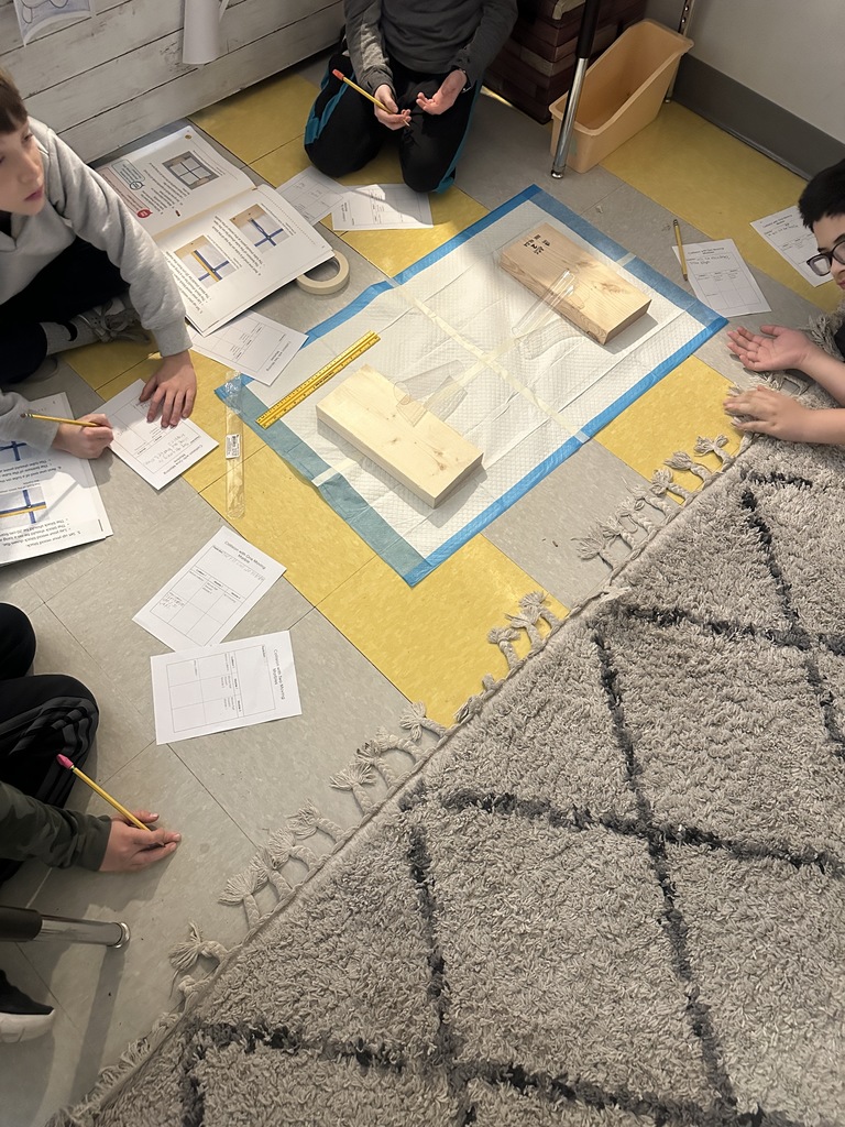 4th graders working on a marble lab