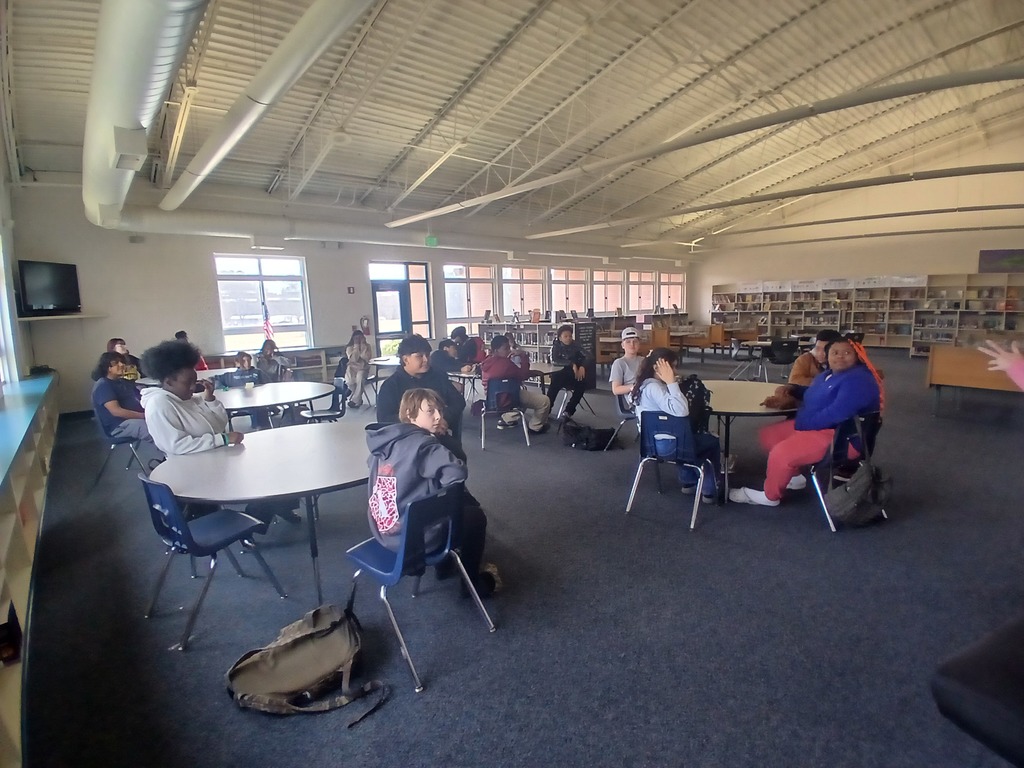 Students create math formula posters in Canva