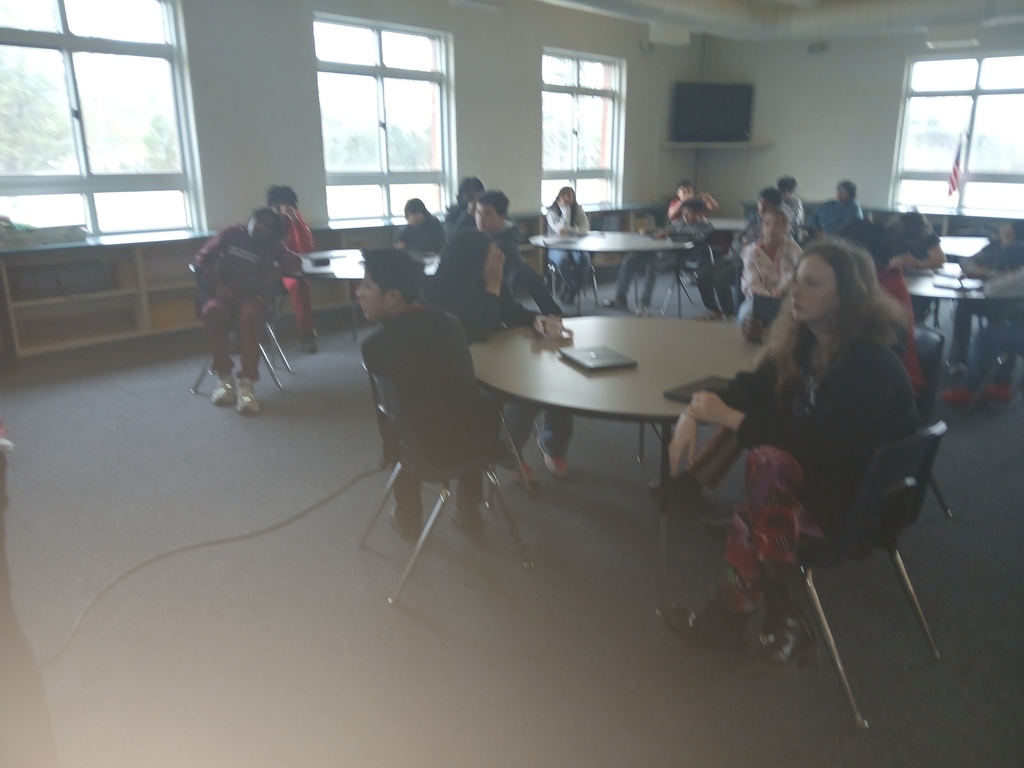 Students create math formula posters in Canva